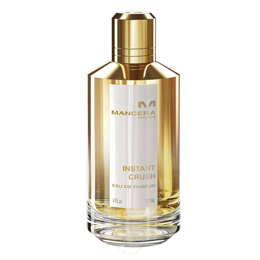Mancera Paris Instant Crush Eau de Parfum fragrance bottle featuring a golden cylindrical body and cap, a prominent white label with black and gold text, and a clear glass base indicating 120 ML