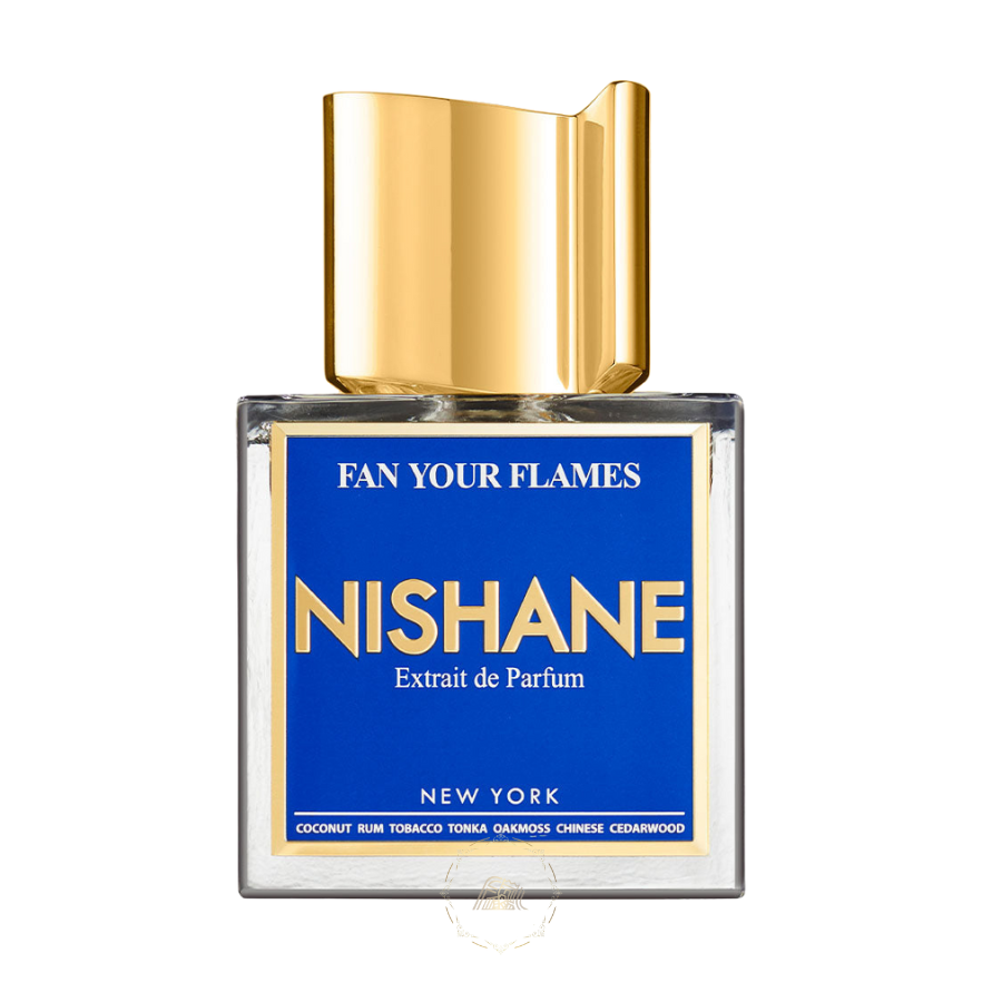 Nishane Extrait de Parfum Fan Your Flames in a clear rectangular glass bottle featuring a vibrant blue label with gold text for New York and listed notes of coconut rum tobacco tonka oakmoss and Chinese cedarwood beneath a distinctive gold cap