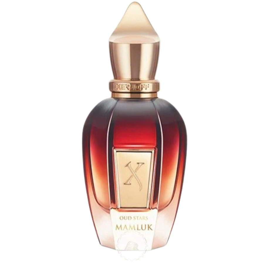 Xerjoff Oud Stars Mamluk perfume bottle with an ombre dark red to amber glass, a distinctive gold spire cap, and a prominent gold X logo on the label