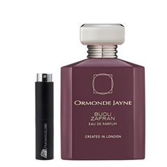 Ormonde Jayne Bijou Zafran Eau de Parfum bottle beside a black travel spray atomizer
