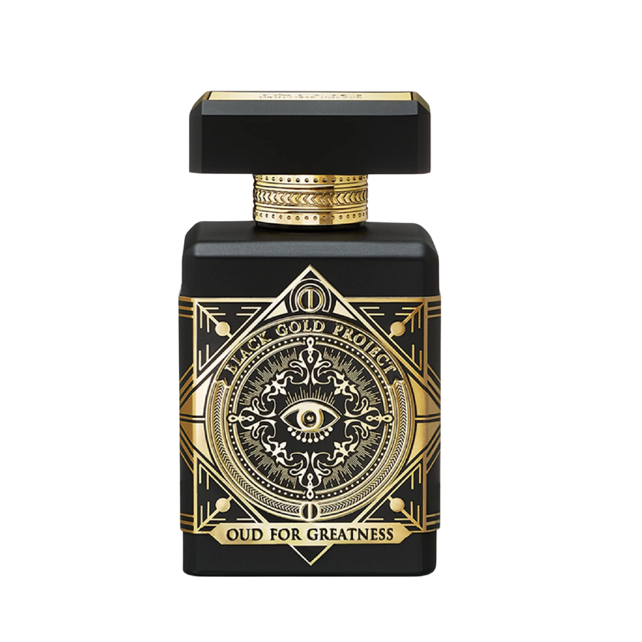 Product image of a rectangular black perfume bottle featuring intricate gold patterns a central eye motif and text reading Black Gold Project Oud for Greatness