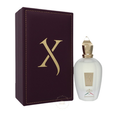 Xerjoff Renaissance perfume on a white background featuring a dark burgundy leather-bound box with a gold X logo next to a frosted white glass bottle with a gleaming gold cap and an Italian flag emblem reading 1861 Renaissance