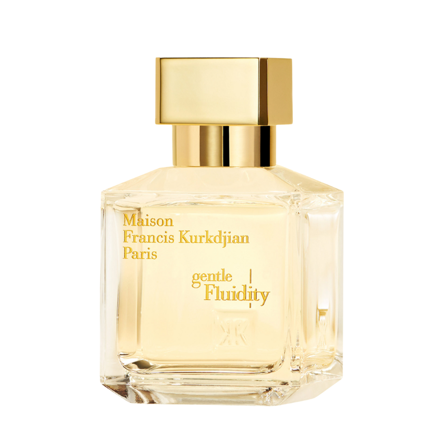 Product photograph of Maison Francis Kurkdjian Paris Gentle Fluidity perfume bottle, a clear faceted glass bottle containing pale yellow liquid, topped with a rectangular gold cap and adorned with gold lettering