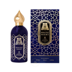 Attar Collection Khaltat Night Eau de Parfum fragrance bottle and box in deep blue with intricate gold Islamic geometric patterns, an ornate gold cap, and a prominent 'A' logo