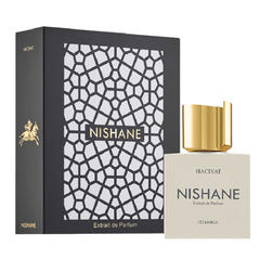 Nishane Hacivat Extrait de Parfum from Istanbul featuring its distinct black box with white geometric Islamic pattern and gold rider on horseback logo alongside a cream rectangular bottle with an iconic gold angular cap