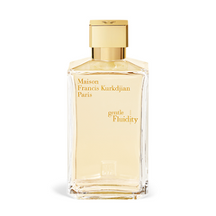 Product photo of a Maison Francis Kurkdjian Paris Gentle Fluidity perfume bottle a clear rectangular glass bottle with a gold cap pale yellow liquid and elegant gold text