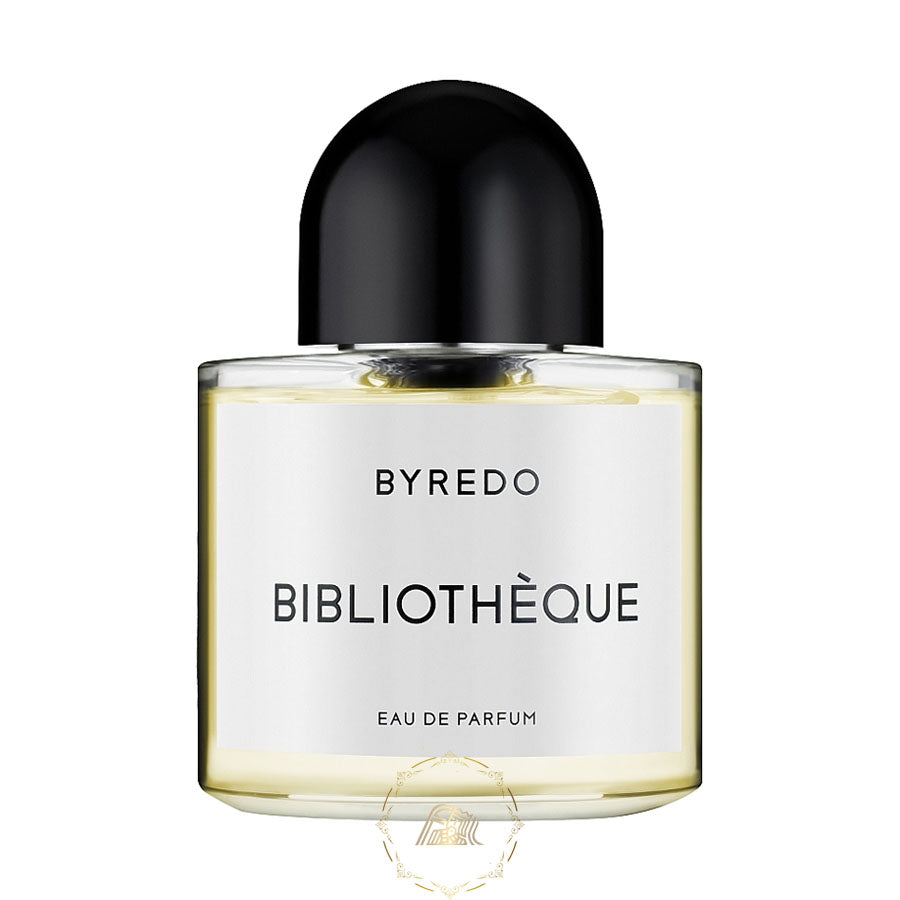 Product photograph of Byredo Bibliothèque Eau de Parfum bottle featuring a clear rectangular glass body filled with pale yellow liquid, a prominent black domed cap, and a white label displaying BYREDO and BIBLIOTHÈQUE in black text