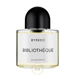 Product photograph of Byredo Bibliothèque Eau de Parfum bottle featuring a clear rectangular glass body filled with pale yellow liquid, a prominent black domed cap, and a white label displaying BYREDO and BIBLIOTHÈQUE in black text