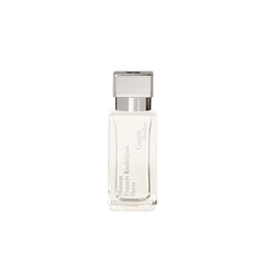 Product photography of a clear rectangular glass Maison Francis Kurkdjian Gentle fluidity perfume bottle featuring a silver cap and vertically printed 'Maison Francis Kurkdjian Paris' and 'Gentle fluidity' labels