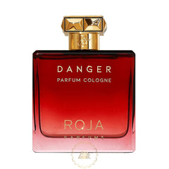 Product photo of Roja Parfums Danger Parfum Cologne in an ombré red glass bottle featuring a distinctive gold faceted studded cap and elegant gold lettering