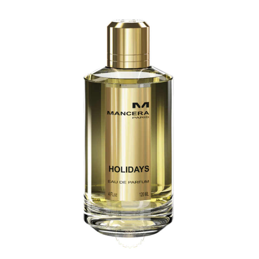 Mancera Paris product photo of a clear glass Holidays Eau de Parfum bottle with a golden hue a reflective gold label displaying MANCERA PARIS logo and HOLIDAYS in black text topped with a shiny gold cylindrical cap