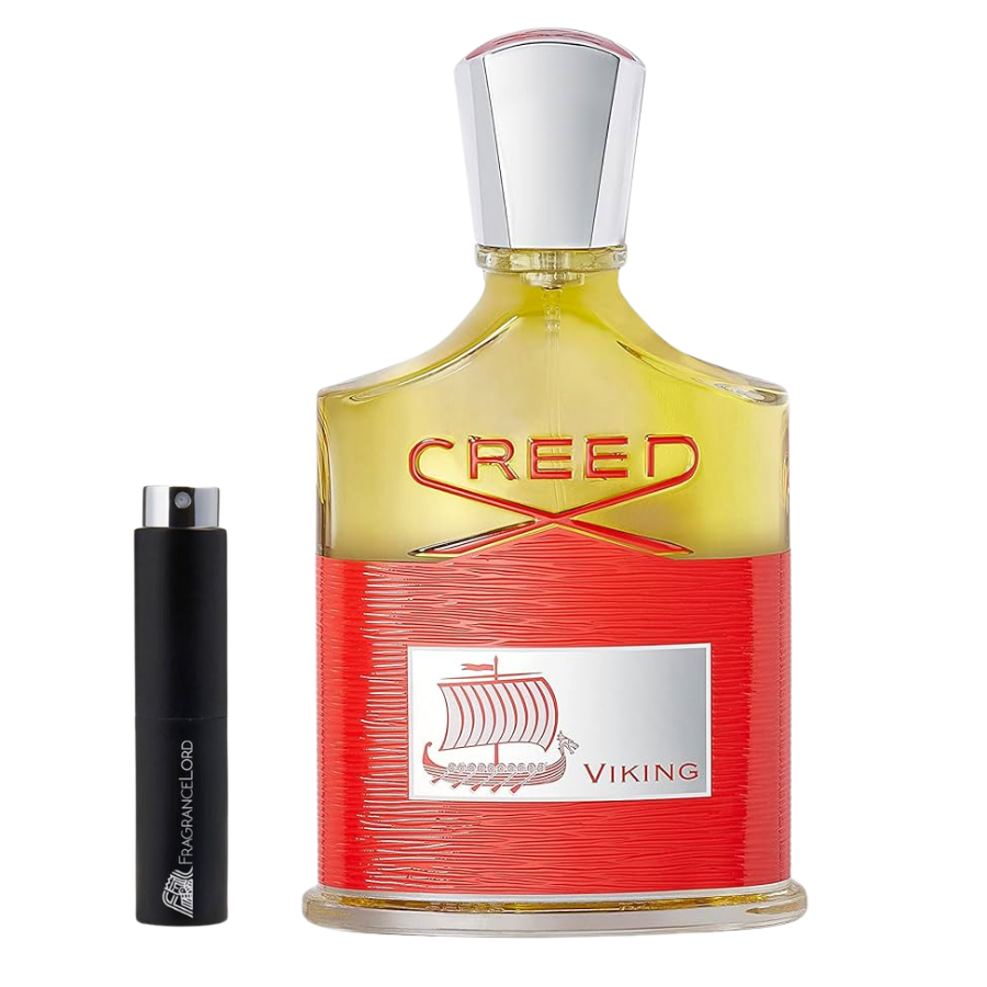 Photograph of Creed Viking fragrance displaying a large red textured bottle with bright yellow liquid, a silver cap, red CREED lettering, and a silver Viking longship logo, paired with a smaller black FragranceLord decant bottle on a white studio background