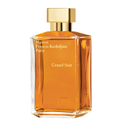 Maison Francis Kurkdjian Paris Grand Soir perfume bottle with radiant amber liquid, a clear rectangular glass design, and a sophisticated gold cap