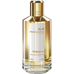 Photograph of Mancera Feminity Eau de Parfum bottle a golden reflective perfume bottle with a crisp white label showcasing the Mancera Paris logo FEMINITY Eau de Parfum and its 120 ML volume