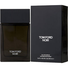 Photograph of Tom Ford Noir Eau de Parfum 100ml, featuring its dark rectangular glass spray bottle with a ridged black cap, displayed beside its matching matte black box with white Tom Ford Noir branding