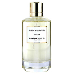 Mancera Precious Oud perfume bottle featuring a clear glass body, prominent gold cap, and a white label with black text identifying the fragrance and the brand from Paris, containing a subtle light amber liquid