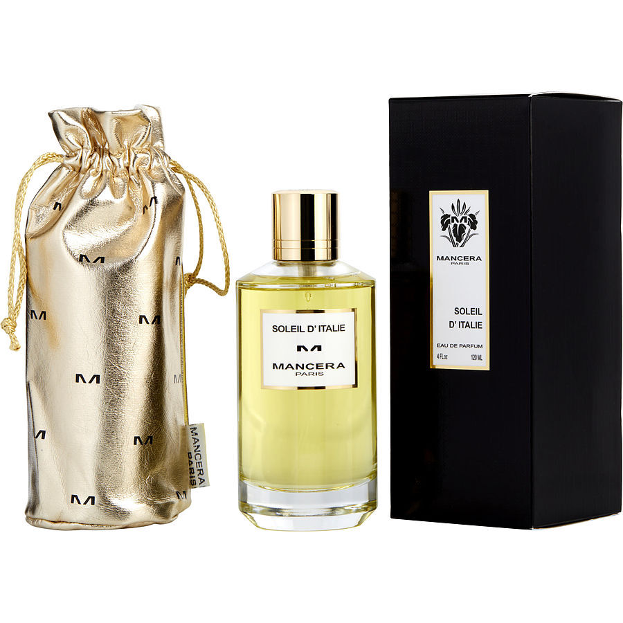Mancera Soleil D'Italie perfume in a clear glass bottle with a gold cap, alongside a gold 'M' monogrammed drawstring pouch and a black box with an iris flower logo label