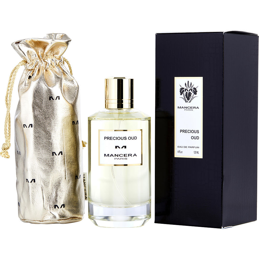 Product photo of Mancera Paris Precious Oud fragrance featuring a clear bottle with a metallic gold cap, a matching shiny gold drawstring pouch with repeated 'M' logos, and its black retail box with brand insignia