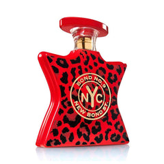 Bond No 9 New York perfume bottle, a star-shaped vibrant red fragrance with black leopard print, prominently displaying a gold NYC logo and matching red cap
