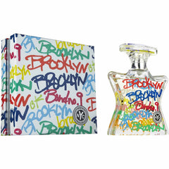 Bond No. 9 fragrance bottle and box featuring a vibrant graffiti-style multi-colored Brooklyn text design, a star-shaped bottle, and the iconic NYC logo