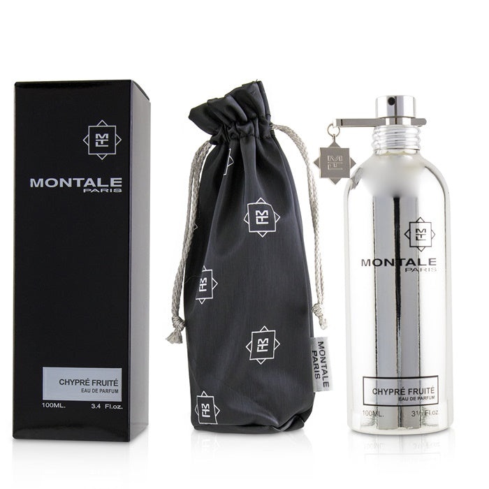 Montale Paris Chypre Fruité Eau de Parfum set displaying a sleek silver metallic bottle, a rectangular black presentation box, and a black drawstring pouch adorned with repeating Montale "M" logos and a silver "M" charm hanging from the bottle