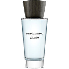 Product Photography, Burberry, a Touch For Men fragrance bottle featuring clear tapered glass, pale blue liquid, a dark textured wooden cap, and black Burberry Touch For Men text on a white studio background
