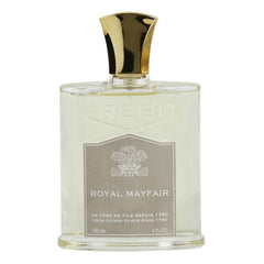 Product photograph of Creed Royal Mayfair fragrance bottle, a clear glass vessel with a golden cap and a beige label featuring the brand's crest and historical text "From father to son since 1760" evoking its London Mayfair origins