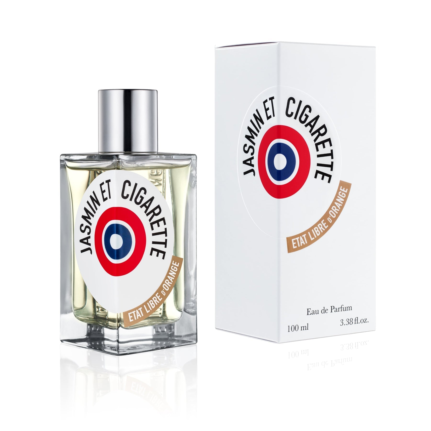 Product Photography of an Etat Libre d'Orange Jasmin et Cigarette perfume bottle and white box on a clean white background, showcasing a clear rectangular bottle with a silver cap, a bold white label featuring a red, white, and blue target logo, and a brown Etat Libre d'Orange brand ribbon detail
