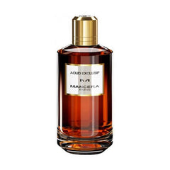 Mancera Aoud Exclusif perfume bottle from Paris featuring a dark amber glass bottle, a shiny gold cap, and a white label with "AOUD EXCLUSIF" prominently displayed
