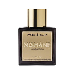 Photograph of Nishane Pachulí Kozha Extrait de Parfum from Istanbul, a dark rectangular bottle with a reflective golden cap and embossed golden label listing notes like patchouli leather and honey incense