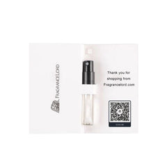 Product photograph of a Fragrancelord perfume sample vial in white thank-you packaging featuring a black atomizer, clear liquid, brand logo, and a QR code