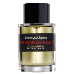 Perfume by Dominique Ropion for Editions de Parfums Frederic Malle, a clear glass bottle of Portrait of a Lady fragrance with golden amber liquid, a black label featuring prominent red title text, and a sleek black cylindrical cap