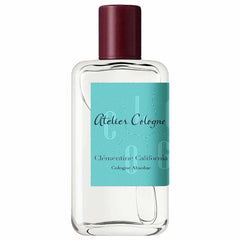 Atelier Cologne Clémentine California Cologne Absolue in a clear rectangular glass bottle with a textured dark red cap and a vibrant turquoise blue label displaying a subtle concentric arch pattern