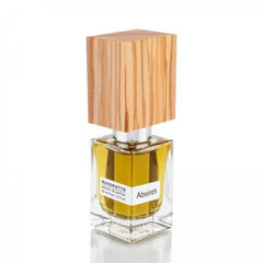 Nasomatto Absinth Extrait de Parfum bottle featuring clear glass, golden yellow liquid, a prominent light wood grain cap, and white labels on a pristine white background