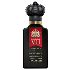 Clive Christian Noble VII perfume bottle with a matte black finish, an ornate textured black crown cap, and a vibrant red label displaying a gold coat of arms, Noble VII in gold, Queen Anne Gardens, Cosmos Flower, and London England