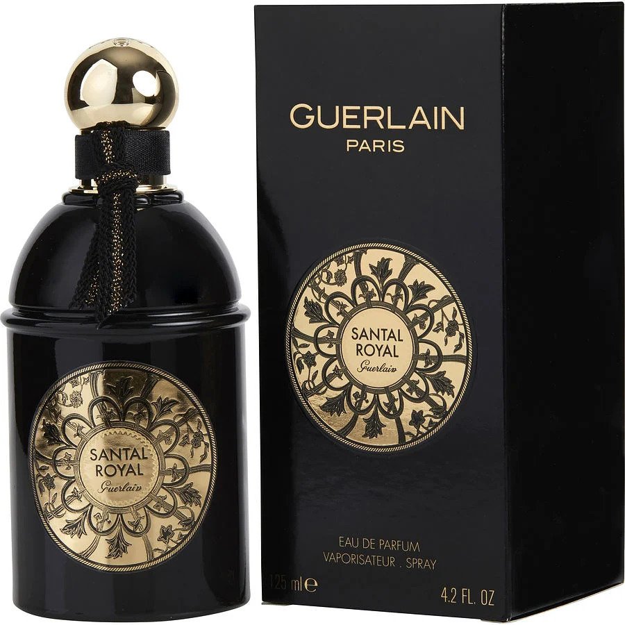 Product photograph by Guerlain showing a black Santal Royal Eau de Parfum bottle with a spherical gold cap and a coordinating black box, both featuring intricate golden filigree labels