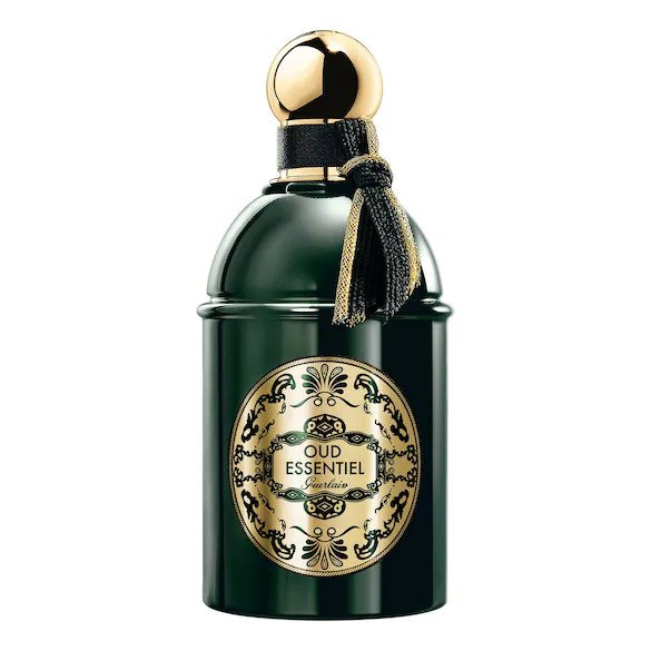 Guerlain Oud Essentiel perfume bottle in dark green with a gold spherical cap, a black and gold tassel, and an ornate gold and green label