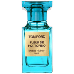 Tom Ford perfume bottle of Fleur de Portofino Eau de Parfum featuring a vibrant turquoise blue glass bottle and a gold rectangular label with black text displaying the product details