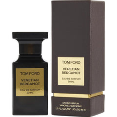 Product photograph by Tom Ford depicting the Venetian Bergamot Eau de Parfum 50ml fragrance, featuring a sleek matte black bottle with a gold label displayed alongside its coordinating dark brown box with gold trim