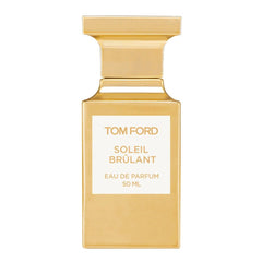 Tom Ford product photograph of Soleil Brûlant Eau de Parfum 50 mL in a sleek golden rectangular bottle with a white label and a matching ridged cap