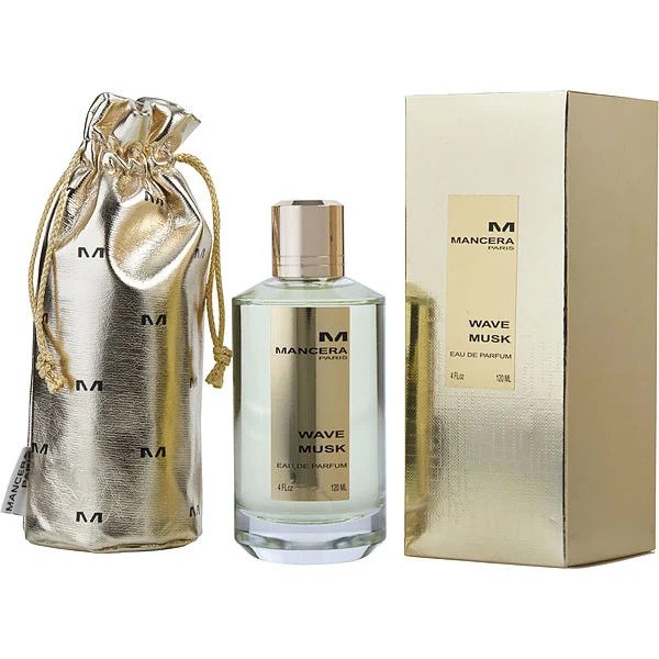 Product photography of a Mancera Paris Wave Musk Eau de Parfum 120ml set featuring a clear glass bottle with a gold cap, a matching shiny gold rectangular box, and a gold drawstring pouch with repeated "M" logos