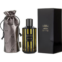 Mancera Lemon Line Eau de Parfum bottle with black and vertical gold stripes its matching black box and a metallic grey satin drawstring pouch featuring repeated M logos