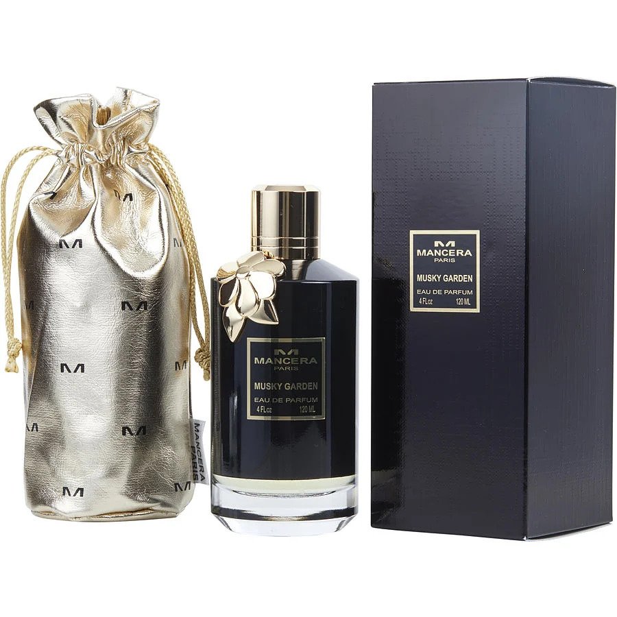 Product image of Mancera Paris Musky Garden Eau de Parfum featuring a sleek black bottle with a gold cap and a gold flower charm, a shimmering gold branded drawstring pouch, and its black presentation box