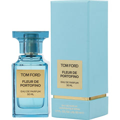 Product photograph of Tom Ford Fleur de Portofino Eau de Parfum 50ml, featuring a translucent light blue glass bottle with a matching ridged cap, alongside its light blue rectangular box with a gold base and gold labels