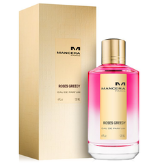 Product photograph of Mancera Roses Greedy Eau de Parfum featuring a bottle with vibrant fuchsia pink liquid and a gold cap, alongside its textured gold box, both displaying the "ROSES GREEDY" label