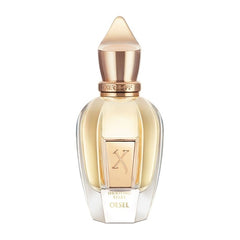 Xerjoff Shooting Stars Oesel perfume bottle featuring a luxurious gold pointed cap, a clear glass body revealing golden liquid, and an ornate 'X' emblem with 'Shooting Stars Oesel' text on the label