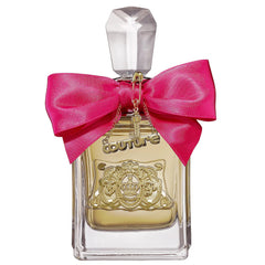 Juicy Couture Viva La Juicy perfume bottle featuring a vibrant fuchsia pink satin bow, a dangling gold "Couture" charm with a tiny key, and an ornate gold crown emblem on the glass bottle